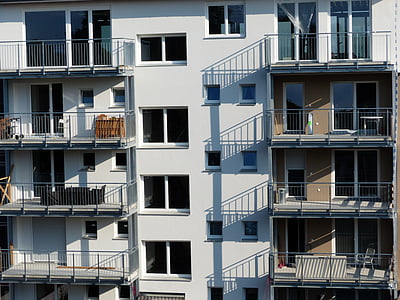 white concrete building at daytime thumbnail