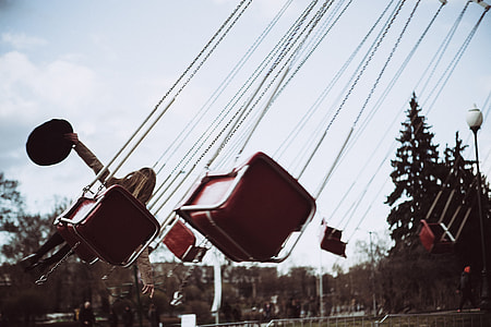 person riding carnival ride thumbnail