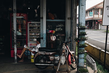 Brown and Red Underbone Motorcycle thumbnail