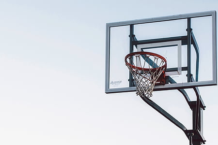 black and gray basketball hoop during daytime thumbnail
