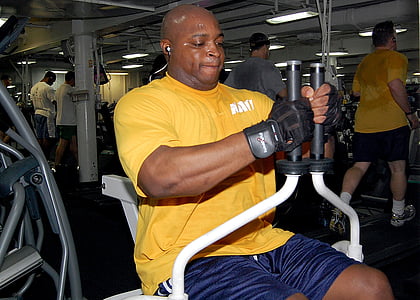 man using white and black exercise machine thumbnail