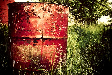 red barrel on green lawn grasses at daytime thumbnail