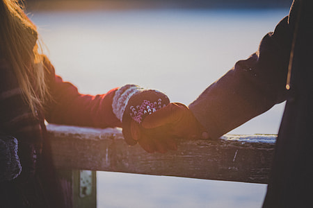 couple holding their hands thumbnail
