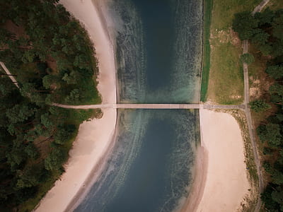 top view photography of bridge and river thumbnail