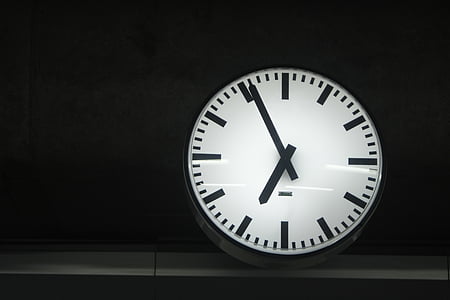 white and black analog clock thumbnail