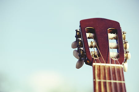 closeup photo of brown classical guitar headstock thumbnail