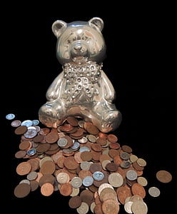 silver-colored bear decor and round coin lot thumbnail