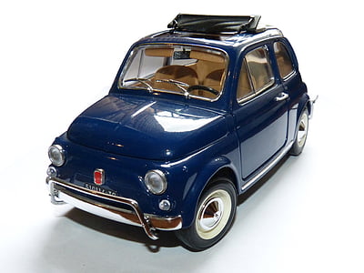 blue vehicle scale model on white surface thumbnail