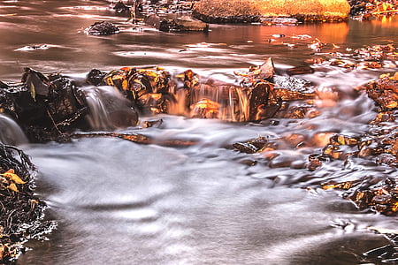 body of water with stones thumbnail