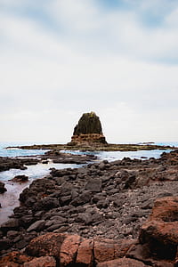 rocks beside sea thumbnail