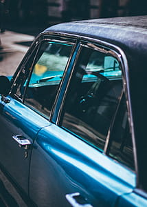 Close-up Photo of Blue Sedan thumbnail