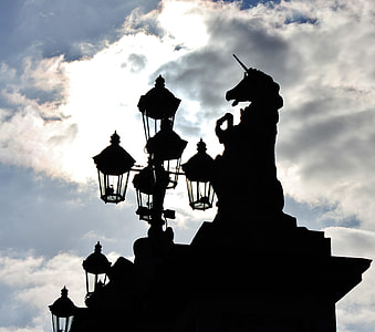 silhouette photography of unicorn statue thumbnail