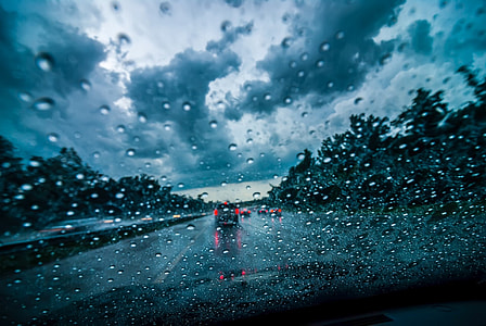 photography of water dew on vehicle windshield thumbnail