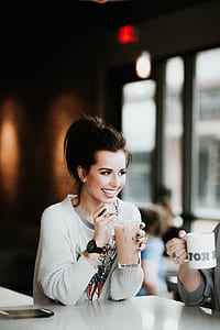 woman holding glass with ice thumbnail
