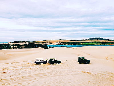 black car on desert thumbnail