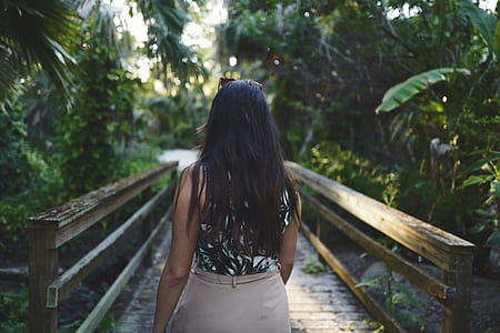 woman walking on the bridge thumbnail
