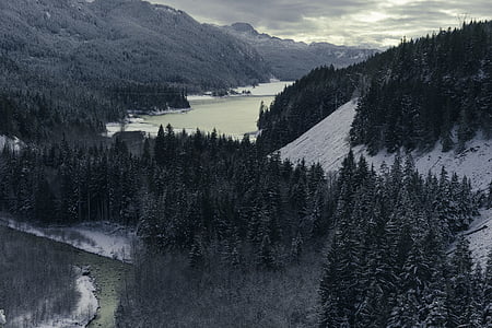 aerial photography of mountain near lake at daytime thumbnail