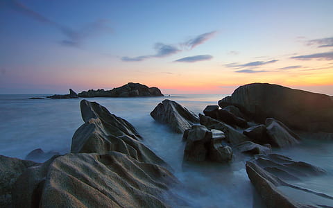 landscape photo of rocks during golden hour thumbnail
