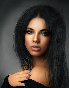 portrait photography of woman in black top thumbnail