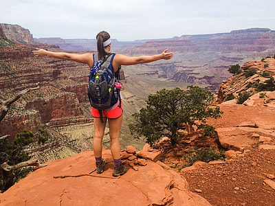 woman standing on cliff thumbnail