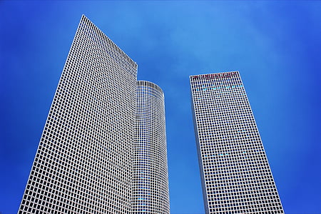 low-angle photography of two high-rise buildings thumbnail