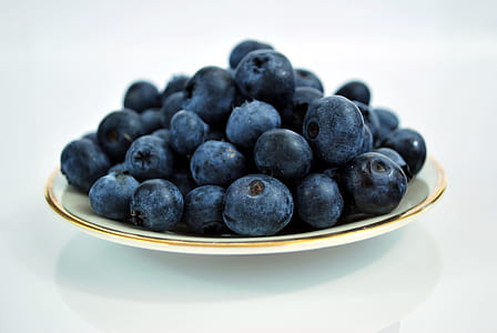black berries on white ceramic plate thumbnail