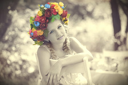 girl sitting in the chair with flower headdress thumbnail