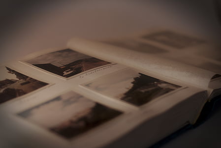 white and black labeled opened book thumbnail