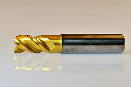 brass-colord drill bit thumbnail