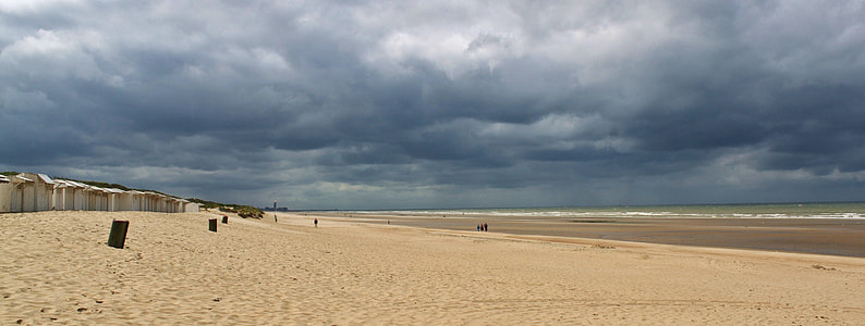 brown sands under gray clouds thumbnail