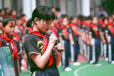 girl holding black wireless microphone thumbnail