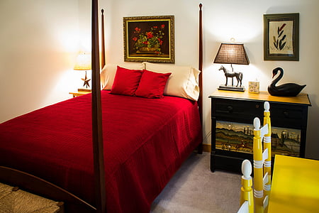 four-poster bed near nightstand thumbnail
