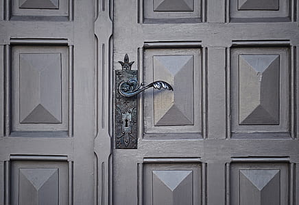 gray door handle on gray panel door thumbnail