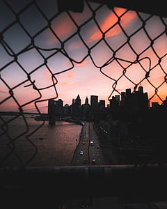 shallow focus photography of city and road during nighttime thumbnail