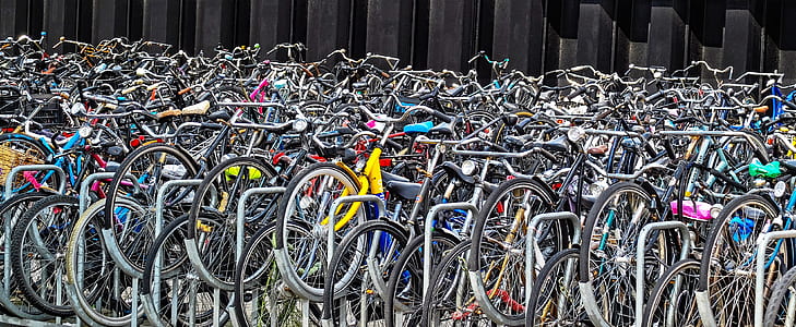 assorted-color bicycle parked in road thumbnail