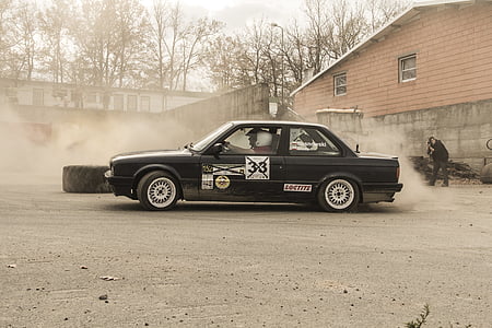 men in black BMW 3 series thumbnail
