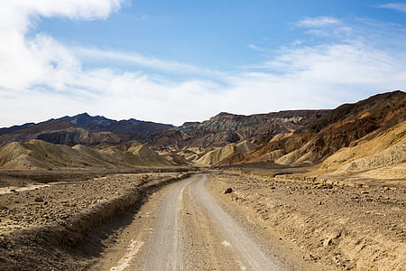 two flat road between mountains thumbnail