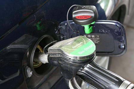 black gas pump in vehicle gas tank thumbnail