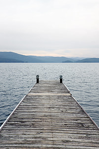 brown wooden dock during daytime thumbnail