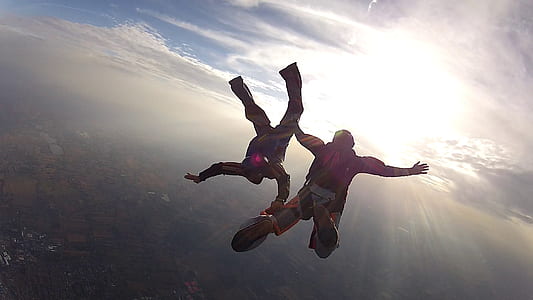 two person sky diving during daytime thumbnail