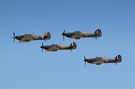 four aircrafts on mid air thumbnail