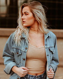 woman wearing blue denim jacket thumbnail