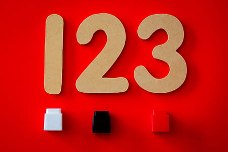 123 Cutout Decor on Red Surface thumbnail