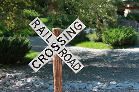 selective focus photo of Rail Road Crossing signage thumbnail