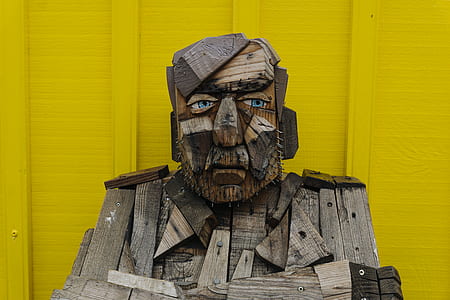gray wooden statue thumbnail