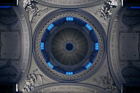 worm's eye-view photography of gray cathedral ceiling thumbnail