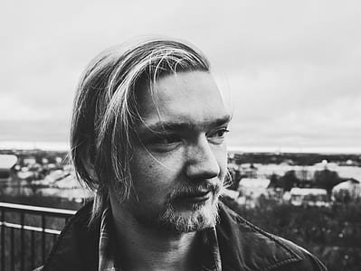 Grayscale Photo of Man in Suit thumbnail