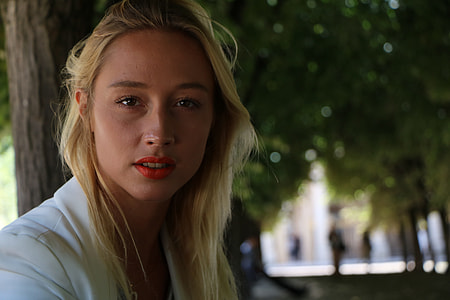 woman with white top and red lipstick thumbnail