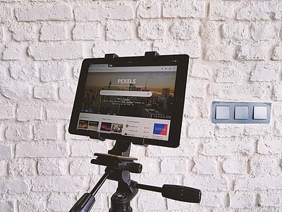 turned-on black tablet computer thumbnail