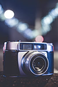 Selective Focus Photo of Gray and Black Slr Camera thumbnail